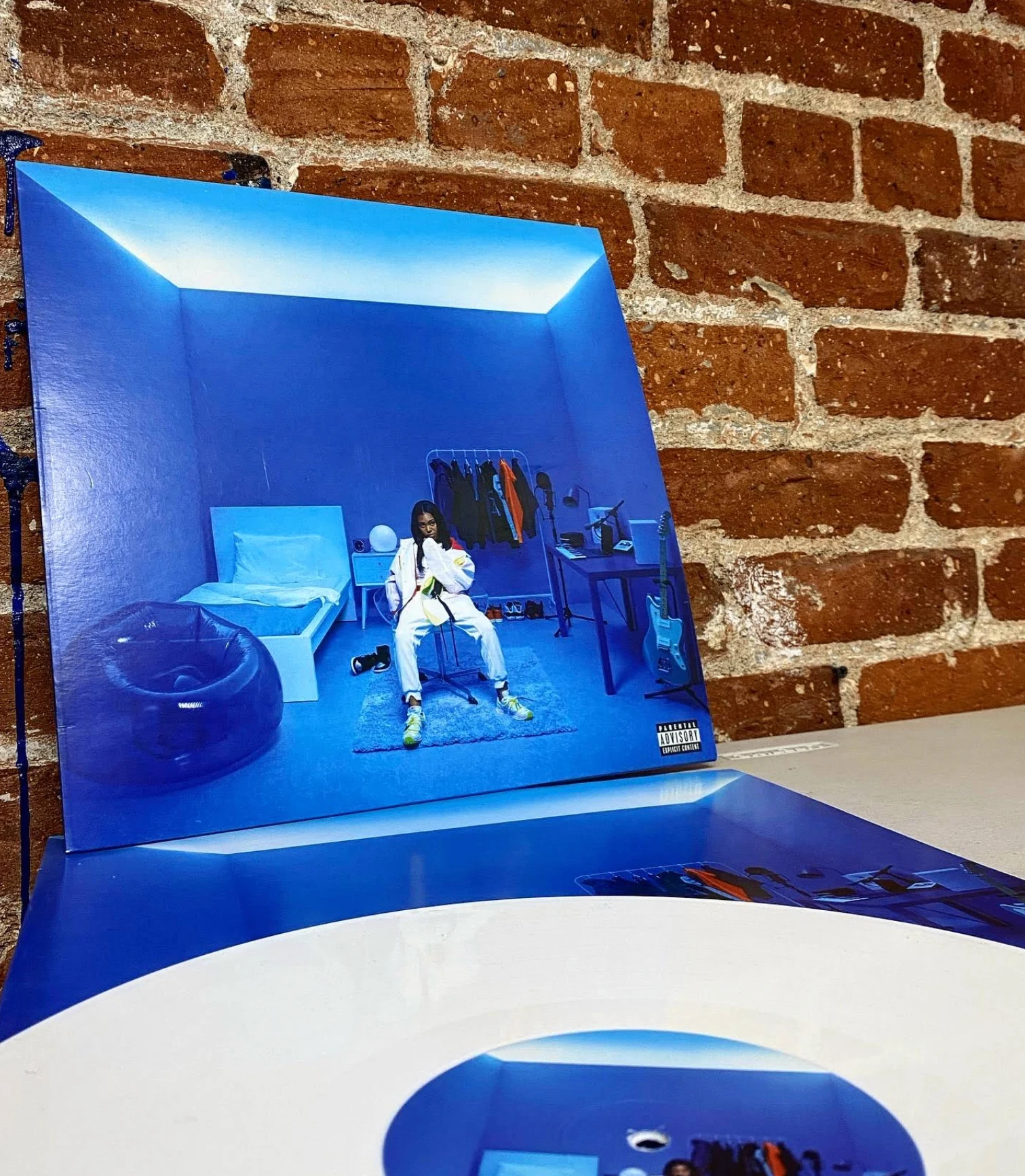 Blue room cover jacket with white vinyl pressed by Unified Artist Services